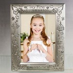 Your child is sure to look great when their first communion photo is displayed inside this Engraved My First Communion Picture Frame. This Engraved First Communion Frame is a wonderful keepsake to remember their special day and is a constant reminder of the importance of their Catholic faith. 