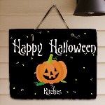 Welcome all the ghosts and goblins to your door this Halloween with our Custom Printed Happy Halloween Welcome Slate Plaque. A unique gift which coordinates with any Halloween home decor with ease. ,br> Your Personalized Halloween Welcome Slate Plaque measures 11" x 9". Each natural slate plaque arrives with a leather strap for wall hanging. Includes FREE Personalization! Personalize your slate plaque with any family name. ( i.e. The Ritchies )