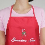 This lovely Personalized Christmas Candy Cane Apron makes a great Christmas gift. Outfit Mom, Grandma, Aunt or favorite cook with this attractive embroidered Christmas apron. 