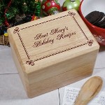 Personalized Holiday Recipe Box - Engraved Christmas Kitchen Recipe Box Give your Grandma, Mom or favorite Aunt her very own Personalized Holiday Recipe Box to safely store all of her most precious Holiday recipes. From her secret Christmas pie recipe to the special way she prepares a holiday turkey are all in one location and ready for the busy holidays. Our Engraved Christmas Recipe Box measures 6.25" x 4.50" x 4.25"H and holds up to 1000, 4" x 6" recipe cards. Engraved Wooden Recipe Box includes FREE Personalization. Personalize your Holiday Recipe Box with any name.