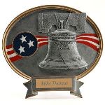 A traditional expression of true patriotism, this Liberty Bell Resin Oval Plaque is the best depiction. This 8  x 8 plaque features a resin embossed image of the Liberty Bell along with the colors of the flag in the background. This Oval Plaque can be personalized with 2 lines on a plate which will be placed on the bottom of the plaque right on the ribbon. This plaque is the perfect way to remember someones dedication and hard work.