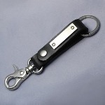 This black leather keychain is perfect because it has a 1 3/4 inch lobster claw that can attach to a belt loop on one end and a key ring on the opposite end. Engrave a special message on the 1 5/8 by 1/2 inch tag. The stainless steel Tag has an elegant brushed matte finish. Great for 16th birthdays for guys, graduation gifts, Fathers Day gifts and birthday gifts.