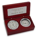 Impress any business associate, professional colleague, special client or loyal customer with this elegant clock and compass gift box idea. The truly unique wooden box features a highly distinctive rosewood finish, with real working clock and compass, both inset and with polished silver detailing. This clock and compass business gift also includes a personalization plate within the inside of the box lid. This makes a highly memorable choice in engraved business presents. This gift is also perfect for including your company name and/or corporate logo. Overall size of 4" x 5 1/2" x 3". This Clock and compass box gift will be sure to make a long lasting memory.