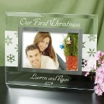 The trees will be glistening in white snow and the two of you will be looking your very best this Christmas when you give a Personalized Our First Christmas Glass Picture Frame to your Mom & Dad, Grandma & Grandpa or Aunt & Uncle. A splendid glass frame sure to look absolutely adorable in any home.