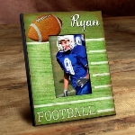 Our Personalized Kids Sports Frames are the perfect way to showcase your little stars latest sports picture. With a wood-like background and featuring the vibrant colors of each sports playing surface, these personalized frames are perfect for his or her room, as a gift for grandma and grandpa and for a proud parents office. Frames measure 8" x 10" and hold a 4" x 6" picture.