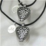 Share the love you share with your Sister, Best Friend or Maid of Honor with matching Personalized Silver Heart Locket Necklaces. Each heart locket is accompanied by an engraved pendant making a treasured keepsake the two of you can cherish for a lifetime.. Our Engraved Stainless Steel Pendant Necklace measures 1/2" x 1/2" with a black necklace measuring 17". Includes FREE Engraving. Personalize your Silver Filigree Heart Lockets with any single initials. ( ie. C / M )