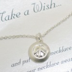 Make a Wish and put on this necklace. When your necklaces wears off your wish will come true. Celebrate a special friendship, graduation celebration or birthday with our trendy Peace sign gift idea.