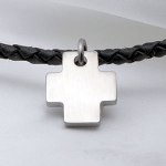 This Black Leather Necklace with Stainless Cross Pendant is well made. The stainless steel cross can be engraved on front and back with a monogram or message. The 4mm leather is a rich black color and very pliable. Lobster clasp. Great for confirmation gifts, communion gifts, graduation gifts, religious gifts