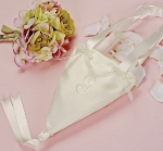 Our Flower Girl Cone takes tradition to new heights. The satin style cone features satin ribbon streamers for the handles and a double ribbon streamer that drops from the bottom of the cone. Organza decorative bows site at the base of the handles on both sides. Available in white and ivory.