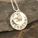 Sterling silver disc with godmother or name on it Sterling silver round faith charm on top Swarovski crystal dangle in any color and/or a freshwater pearl. Please state colors in personalization box otherwise it will come with NO dangles. Includes sterling silver ball chain necklace