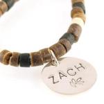 Necklace is made of coco and nut heishi beads and features a hand stamped sterling silver disc with boys name and a leaf motif. If you would like a different one of our symbols we have available, just state that in the personalization area on this page. Great gift idea for a teen age boy, baptism gift, confirmation gift...