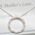 A Mothers Love Knows No End... Pave style crystals on a silver like ball chain. Send mom a gift of love and let her know you love her too. 