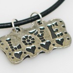 Who doesnt love love? Our Love charm necklace allows to you express yourself...love and be loved. 