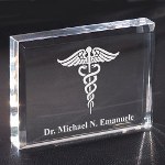 Show your favorite doctor how thankful you are by giving a Personalized Medical Gift. Each Engraved Medical Keepsake is professionally engraved for optimal presentation. Our exquisitely clear Personalized Keepsake Paperweight makes a perfect selection. This Medical Gift stands 3" x 4" with soft edges measuring 1/2" thick. Includes FREE Personalization! Personalize your Medical Gift with any Doctors Name.