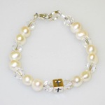 Our white freshwater pearl and crystal bracelet is a simple and thoughtful keepsake gift to give on a special baptism or christening day or communion day.