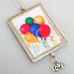 Celebrate a special birthday in personalized style with our Birthday Frame Photo Necklace. This fun necklace is the perfect gift to give to teens, young adults and even those fun girlfriends for a trendy style gift. Comes with a Love charm. Add a birth month dangle for an additional fee. The birth month dangle hangs with the Love Charm.