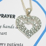 Celebrate a special nurse, nurse retirement or graduation with our Crystal heart nurse prayer necklace gift.